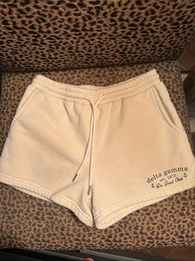 TCL Cream Delta Gamma Logo Athletic Shorts